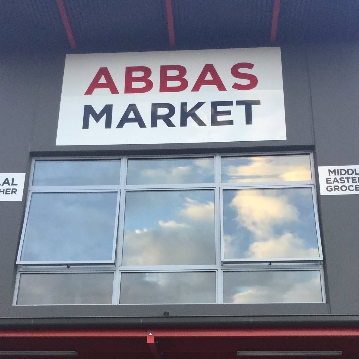 Abbas Market storefront with red and charcoal signage on Prospect Road, Blair Athol